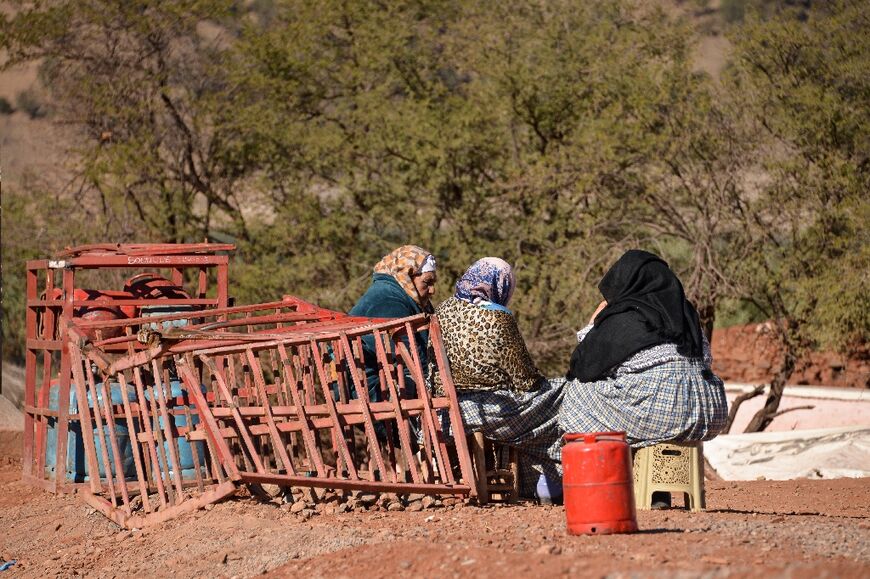 Displaced Moroccan women at a camp set up following the September 8 earthquake, in a mountain area where winter can be freezing