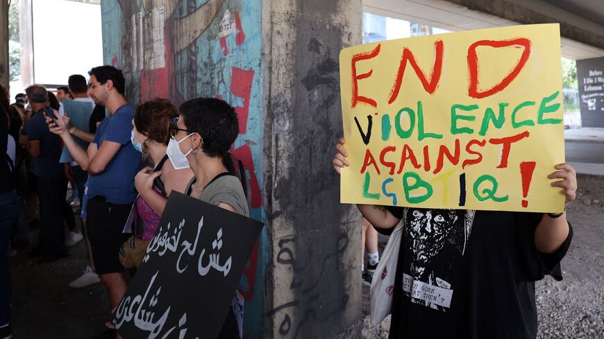 Lebanese protesters denounce violence the LGBTQI community and others in downtown Beirut, July 31, 2022. 