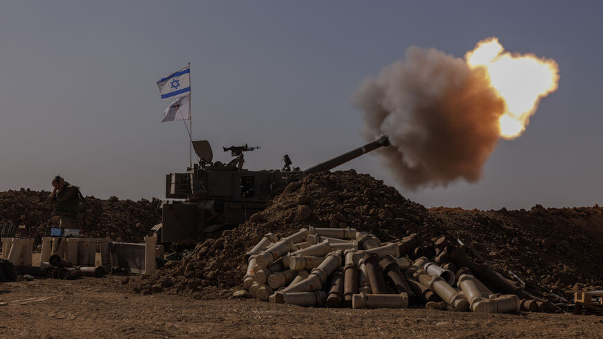 An Israeli artillery unit fires from the Israeli side of the border toward the Gaza Strip on Nov. 6, 2023, in southern Israel. 
