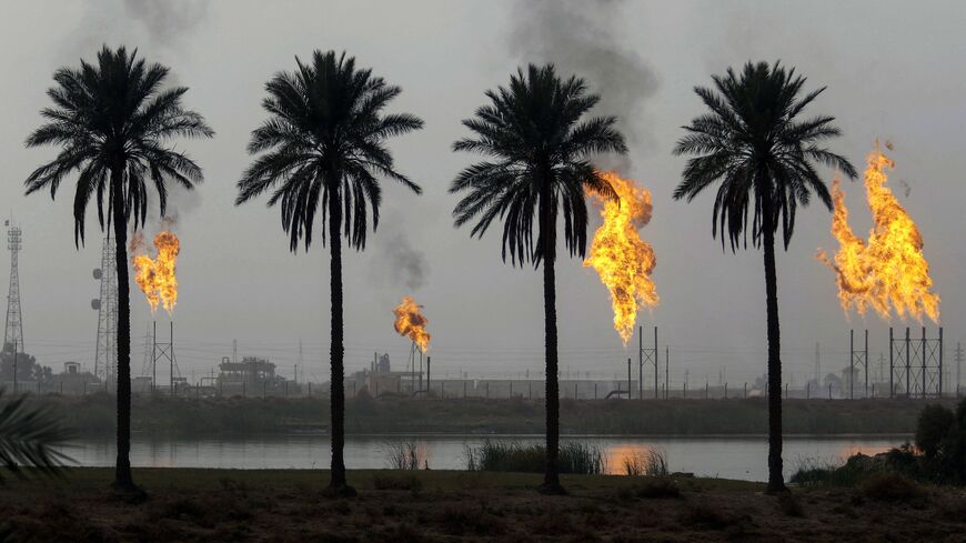 Excess hydrocarbons being burned off at the Nahr Bin Omar natural gas field, north of the southern Iraqi port of Basra, January 22, 2018.